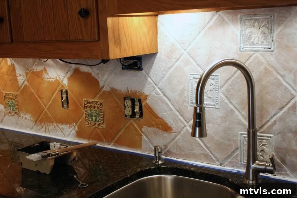 My Backsplash Solution Painting Tile 5 Applying primer to kitchen tile backsplash before painting