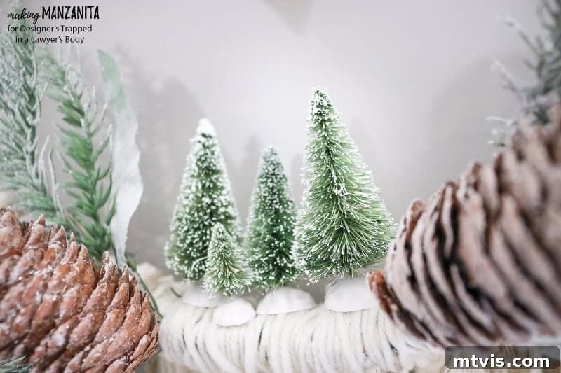 Craft Your Boho Winter Wreath 13 Stylishly displayed, the DIY Boho Winter Wreath adds a sophisticated touch to a neutral-toned wall, showcasing its harmonious design and ability to complement modern farmhouse decor effortlessly.