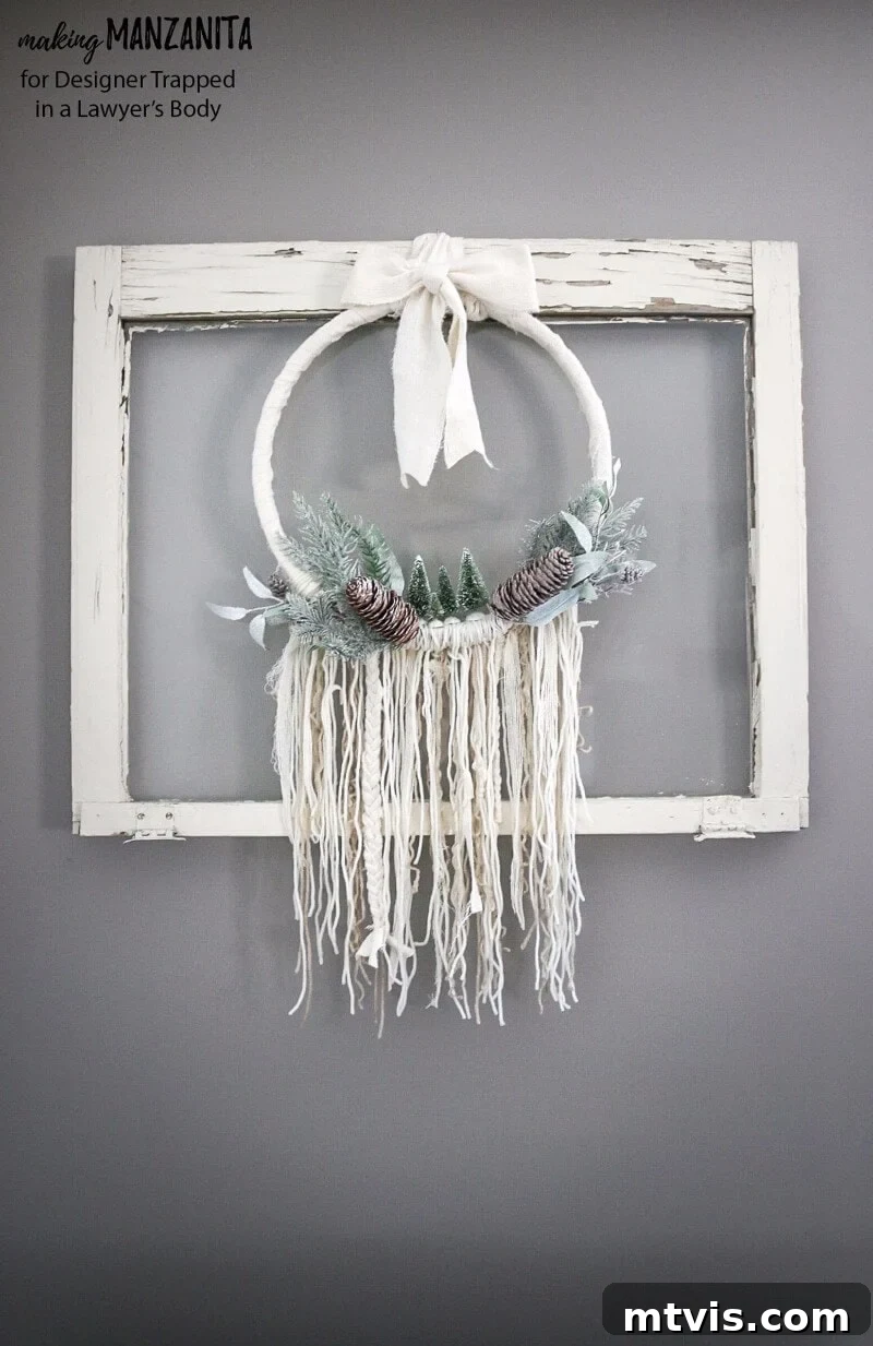Craft Your Boho Winter Wreath 15 A vibrant display of the DIY Boho Winter Wreath, perfect for adding cozy, budget-friendly style to any home throughout the winter season, blending seamlessly with rustic and modern aesthetics.