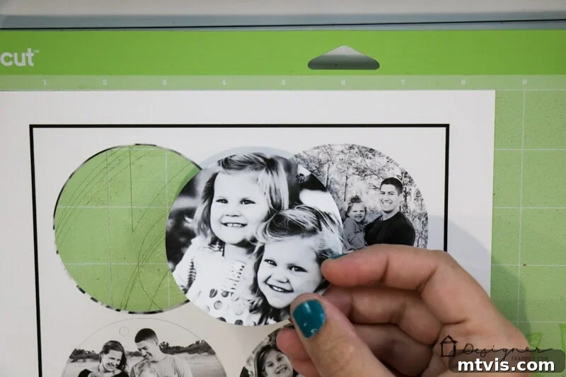 Transform Your Cherished Photos Into Handmade Christmas Ornaments 3 Cricut machine perfectly cutting circular photos for DIY ornaments