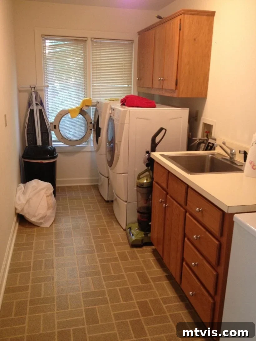Space-Saving Secrets: 9 Genius Hacks for Bigger-Looking Rooms 14 A first-floor laundry room is darker and looks smaller with windows covered by old blinds. This 'before' image clearly shows how heavy window coverings restrict light and shrink a room.