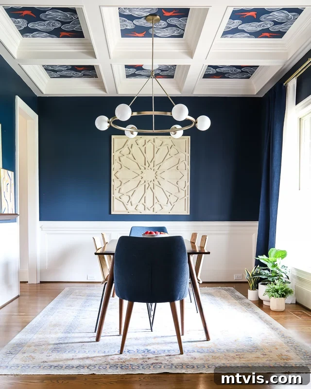 Space-Saving Secrets: 9 Genius Hacks for Bigger-Looking Rooms 6 Floor to ceiling curtains hang on the side wall in a blue dining room create the illusion of a bigger room. The flowing drapes soften the space and contribute to an open feel.