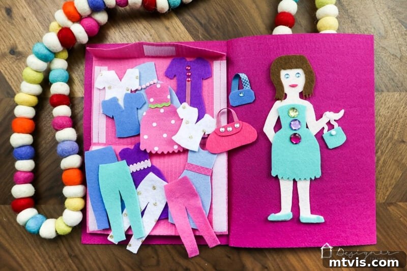 Felt Doll Craft Kit 11 DIY felt doll kit open with doll and clothes laid out for play.