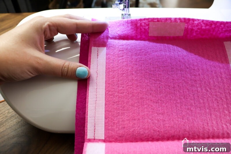 Felt Doll Craft Kit 5 Sewing Velcro onto the felt pockets for the DIY felt doll kit.
