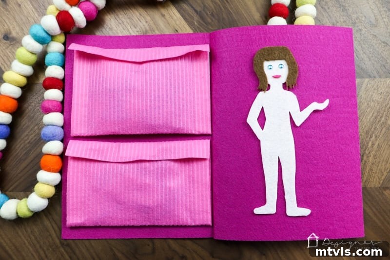 Felt Doll Craft Kit 10 DIY felt doll kit closed, showing neat storage of clothes.