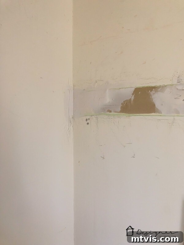 How to Repair Drywall: Tips for Minor Repairs 7 drywall repair showing wet spackling paste