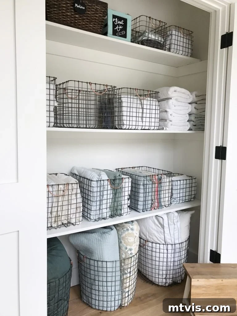 Smart Solutions for a Perfectly Organized Linen Closet 13 linen closet using vertical folding in wire baskets