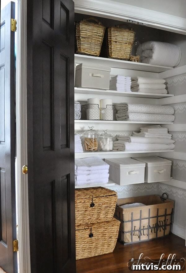 Smart Solutions for a Perfectly Organized Linen Closet 14 neatly organized linen closet with stenciling and neutral colors