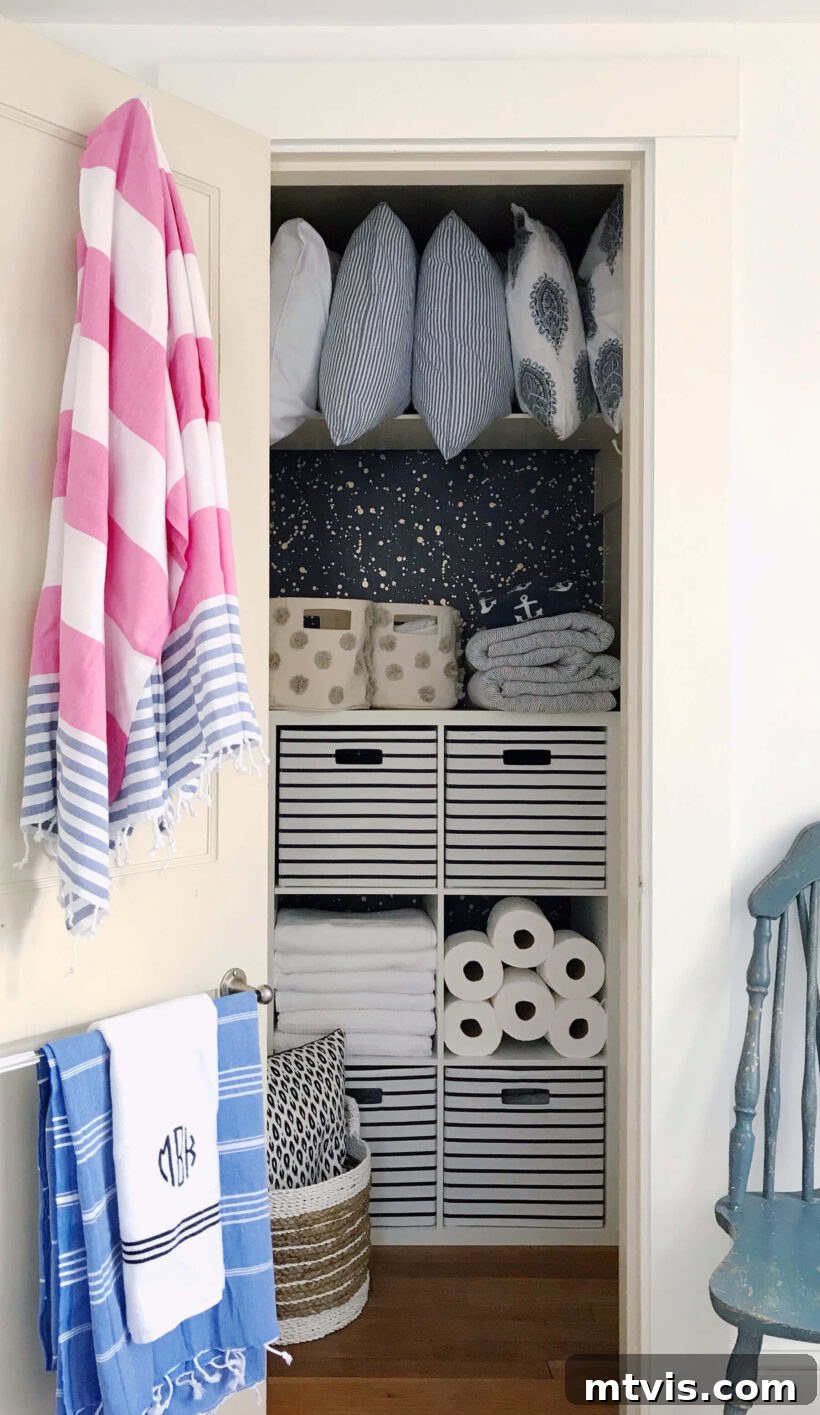 Smart Solutions for a Perfectly Organized Linen Closet 15 linen closet with wallpaper and shelf unit for organization