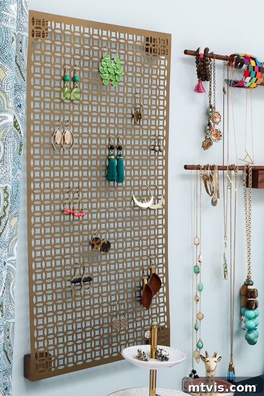 Sparkle and Store: DIY Jewelry Organizers for Every Piece 14 Close-up of organized jewelry hanging on the DIY display