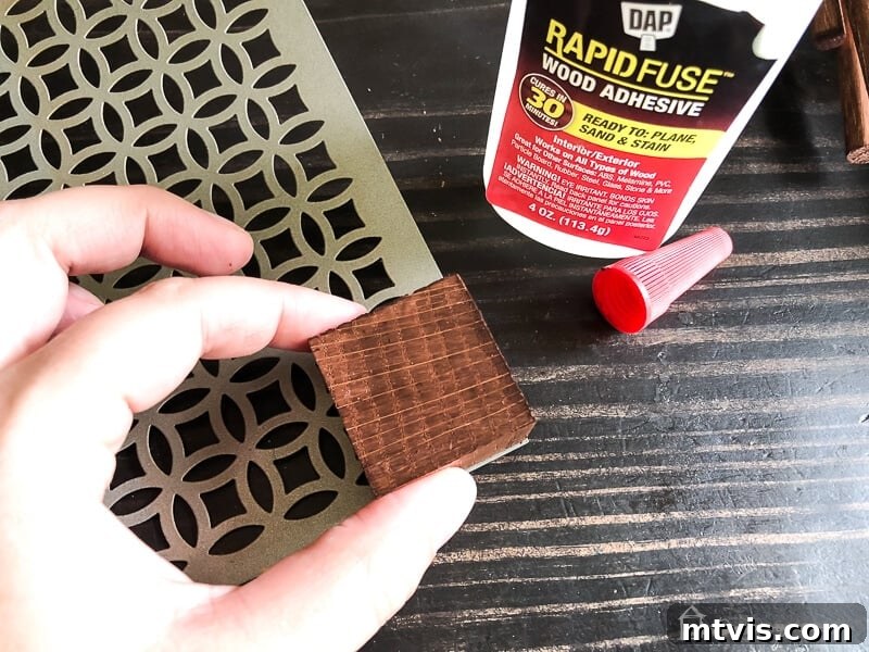 Sparkle and Store: DIY Jewelry Organizers for Every Piece 7 Wood block being precisely aligned and clamped to the aluminum sheet
