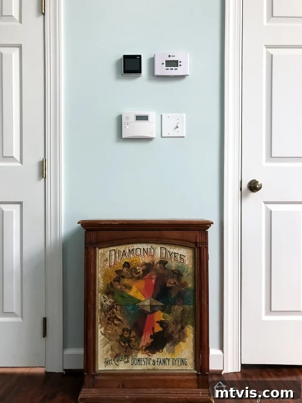 Effortless DIY Abstract Art Canvas 12 Wall with visible thermostat and alarm pad before art
