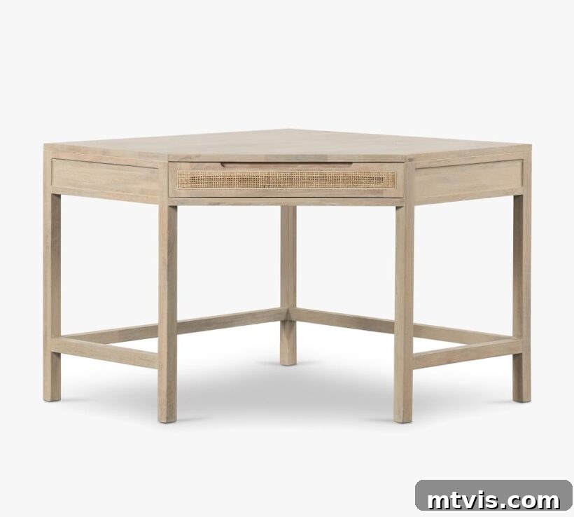 L-Shaped and Corner Desks: Build Your Own or Buy 8 A small, bare wood corner cane desk with central drawer against a white background.