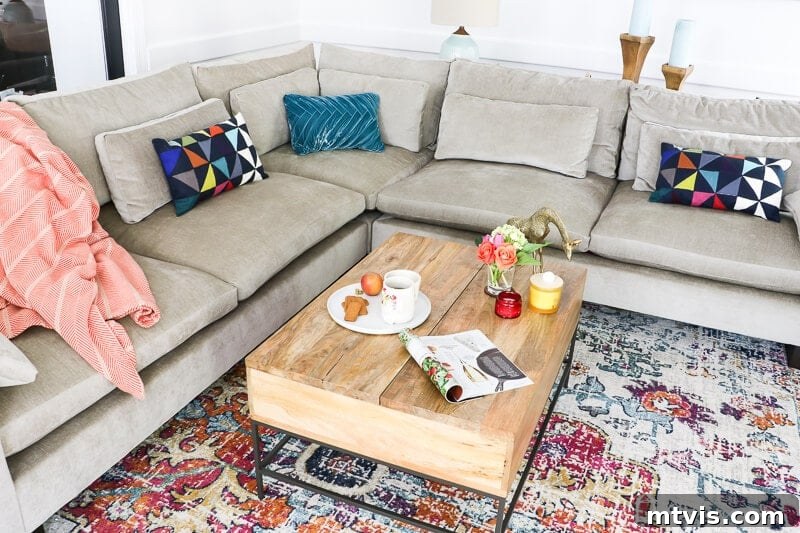 Vibrant Transformations for Family Rooms 4 Close-up of the West Elm Harmony Sectional Sofa showing distressed velvet fabric