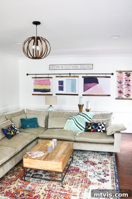 Vibrant Transformations for Family Rooms 8 West Elm Harmony sectional in family room with custom watercolor artwork