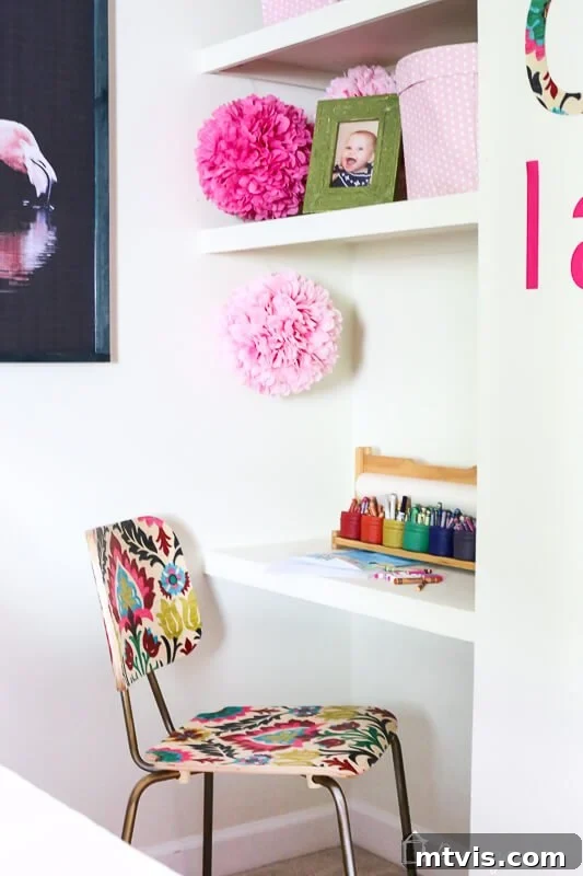 Rainbow Hues: A Little Girl's Bedroom Tour 6 Colorful big girl room with decoupaged chair and personal touches