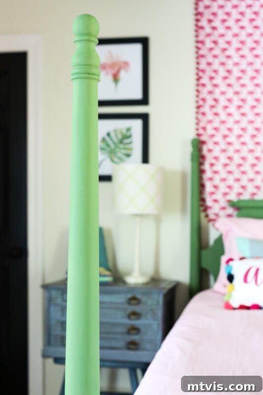 Rainbow Hues: A Little Girl's Bedroom Tour 9 Green four poster bed with colorful accents in a girl's room