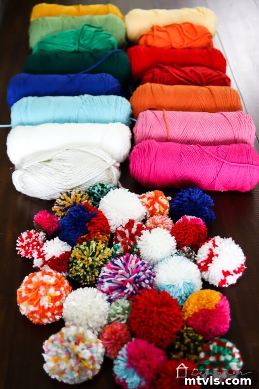 Fluffy Pom Pom Wreath Craft 3 Selection of colorful yarn and pom poms ready for DIY wreath project