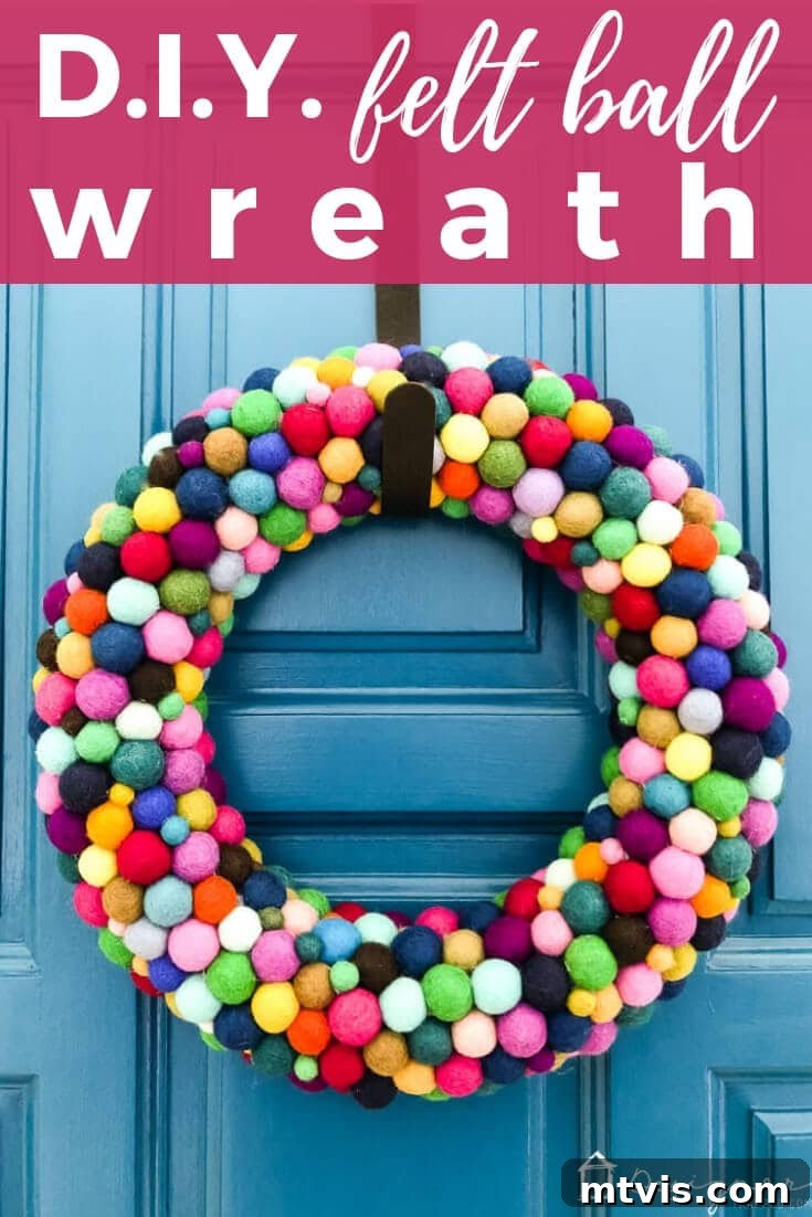 Vibrant Felt Ball Wreath Project 2 Vibrant DIY felt ball wreath, bursting with a spectrum of colors, ready to brighten any home decor.