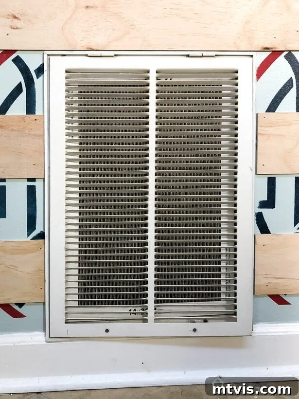 Stylish DIY Vent Cover Made Simple 12 Before image of a plain, standard builder-grade air grille cover.