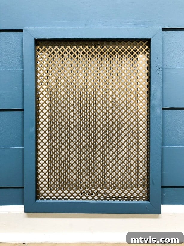 Stylish DIY Vent Cover Made Simple 13 After image showcasing a beautifully installed DIY decorative air vent cover on a wall.