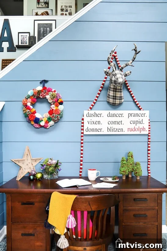 colorful Christmas decor in entry way, featuring a DIY wreath