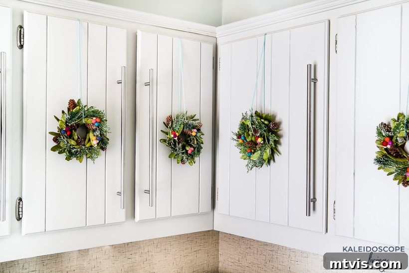 Mini Wreaths: Tiny Touches, Big Christmas Joy 7 Finished mini wreaths hanging on kitchen cabinets