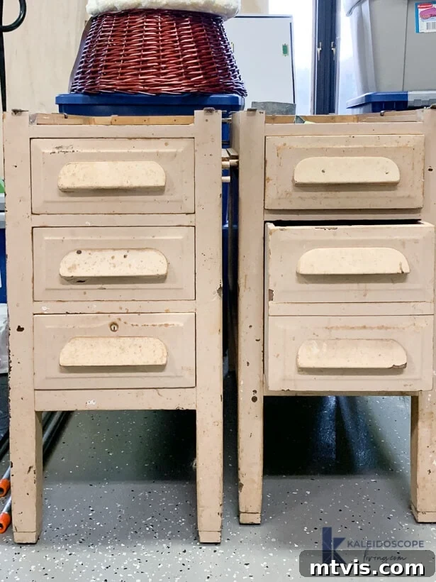 Two damaged wood nightstands with an upside-down wicker basket on top. 