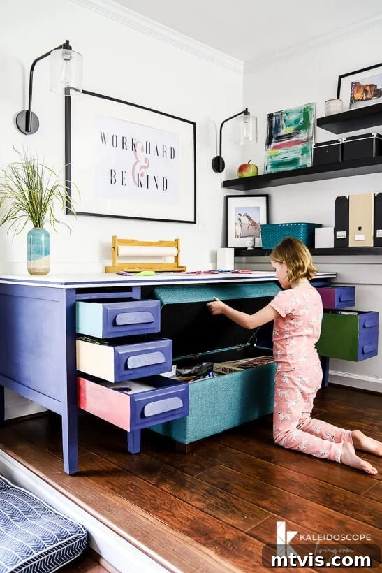 Chalk Paint Secrets: Your Complete Guide to Furniture Makeovers 13 Full view of the finished desk, painted with Behr Chalk Decorative Paint in Timeless Blue. The transformation provides both beauty and practical storage for an art table. Long-lasting finish.