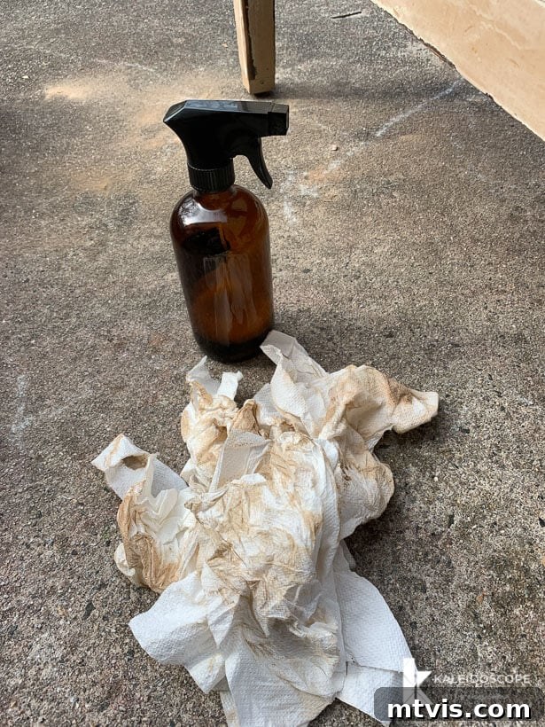 Chalk Paint Secrets: Your Complete Guide to Furniture Makeovers 5 Dirty paper towels after cleaning furniture, showing the amount of hidden grime removed before painting. A crucial step for a successful, long-lasting finish. Behr Chalk Decorative Paint preparation.