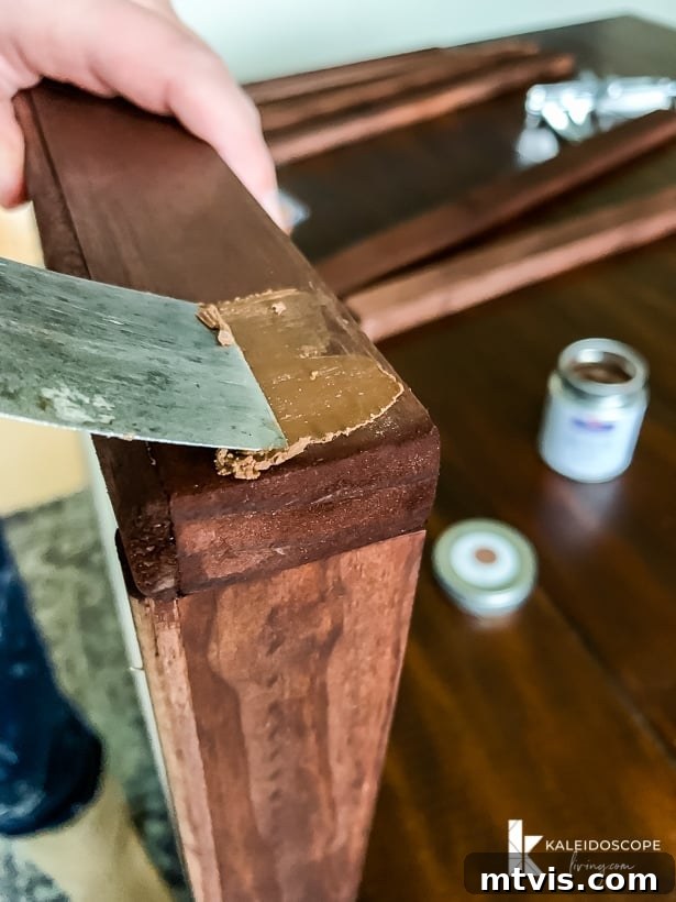 DIY Oversized Frames Stunning Decor Under $20 12 Final touch-up with Patchal Putty on DIY picture frame.