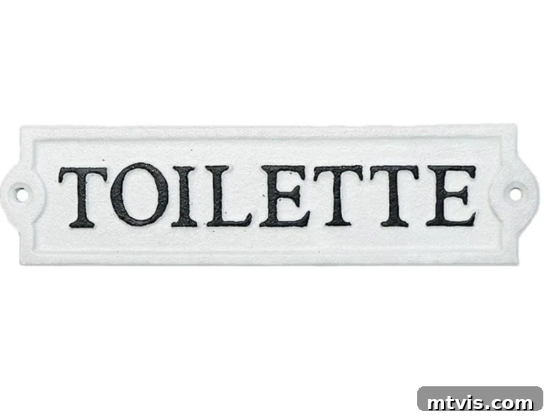 Heavy-duty cast iron 'Toilette' sign with a French-inspired, nostalgic design, perfect for vintage or rustic bathrooms.
