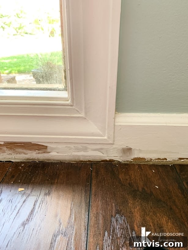 Dap Alex Plus Spackling on damaged baseboard