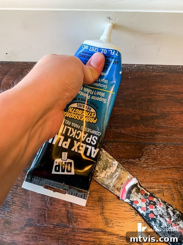 DAP Alex Plus Spackling to fill nail holes