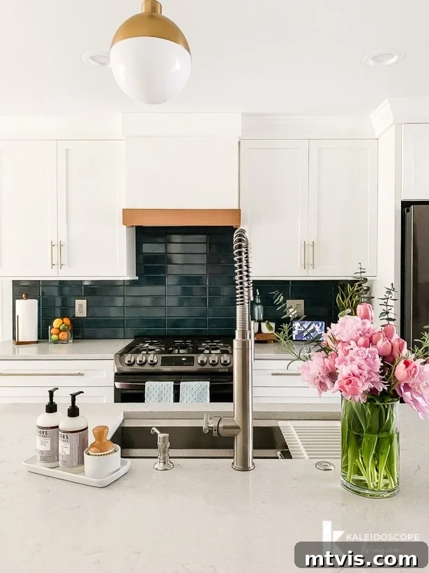 modern kitchen remodel after photo, highlighting the streamlined design and ample pantry space