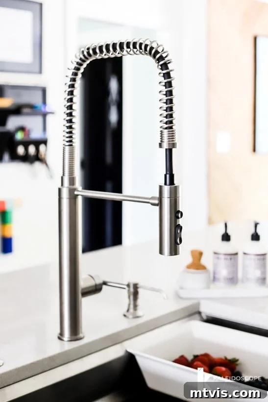 kohler purist faucet in kitchen remodel, showcasing its sleek, contemporary design
