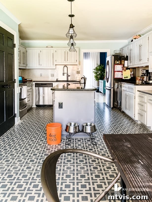 gray kitchen with painted and stenciled floors, showcasing a previous budget-friendly update