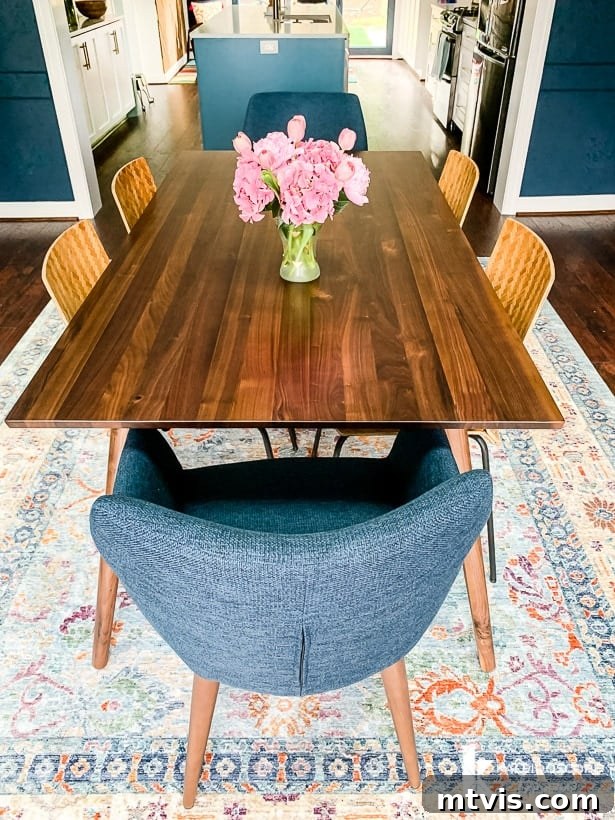 Article's Seno extendable walnut dining table in a mid-century modern dining room