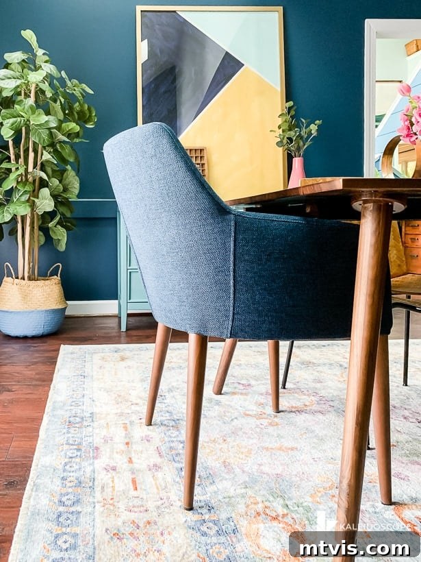 Article's Feast Twilight Blue dining chairs in an eclectic dining room setting