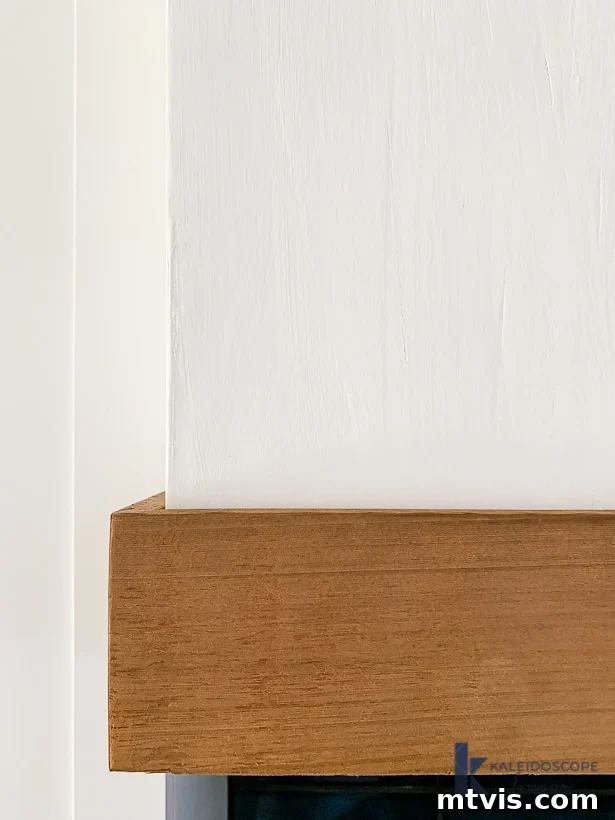 Wood and White Concrete: A DIY Range Hood Transformation 14 Close-up of the DIY range hood with its unique white concrete finish, highlighting the textured surface