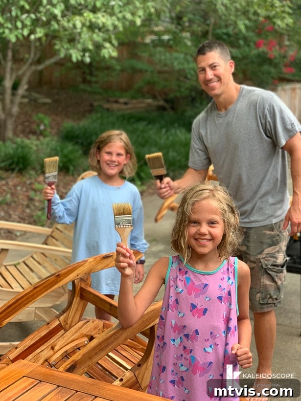 Revitalize Your Teak: A 4-Step Guide 13 Family applying teak oil to outdoor furniture, a DIY project
