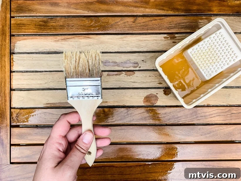 Revitalize Your Teak: A 4-Step Guide 16 Before and after comparison of outdoor table with teak oil