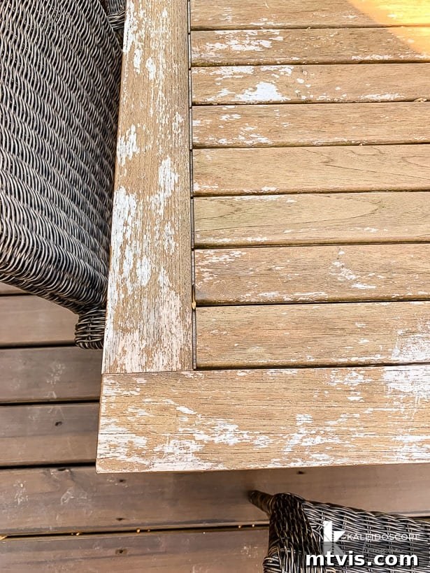 Revitalize Your Teak: A 4-Step Guide 6 Unevenly weathered teak outdoor table, close-up of distressed surface