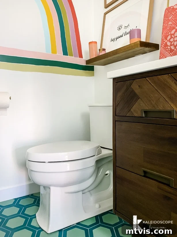 Handmade Hues: Our Vibrant Bathroom Makeover 20 Kohler toilet with a modern square base in a colorful bathroom.