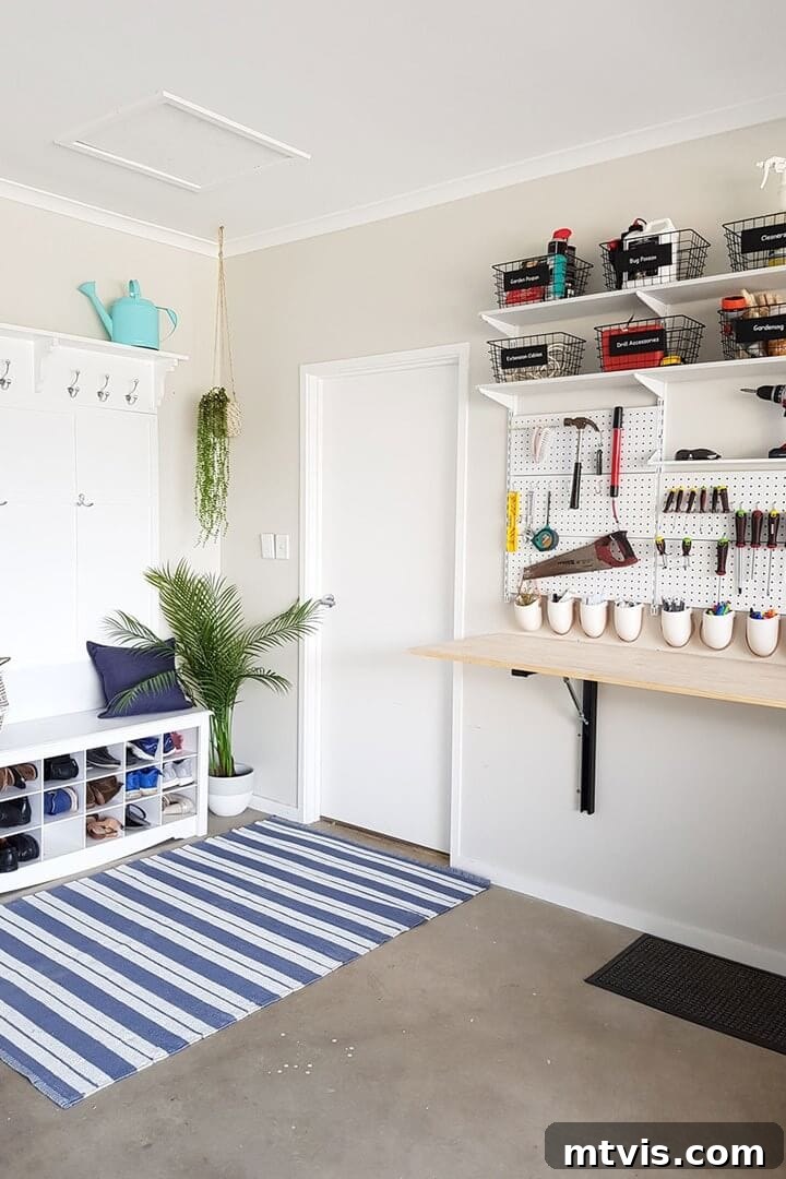 Beautiful mudroom and pegboard storage in a garage entryway, offering functional family organization.