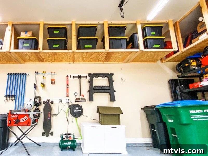 Custom DIY overhead garage storage solution for large totes and bins, maximizing vertical space.