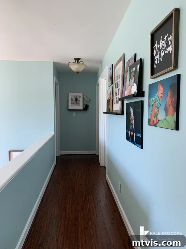 Upstairs Hallway Transformed: A Kaleidoscope of Color 2 hallway decorated with family photos