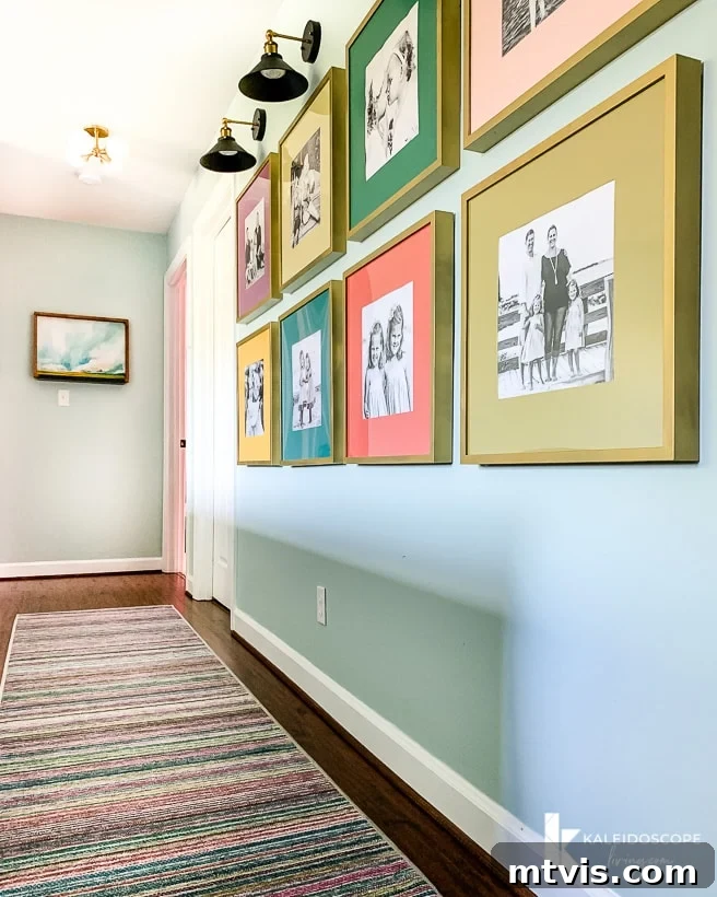 Upstairs Hallway Transformed: A Kaleidoscope of Color 4 hallway with Ruggable runner and colorful frames