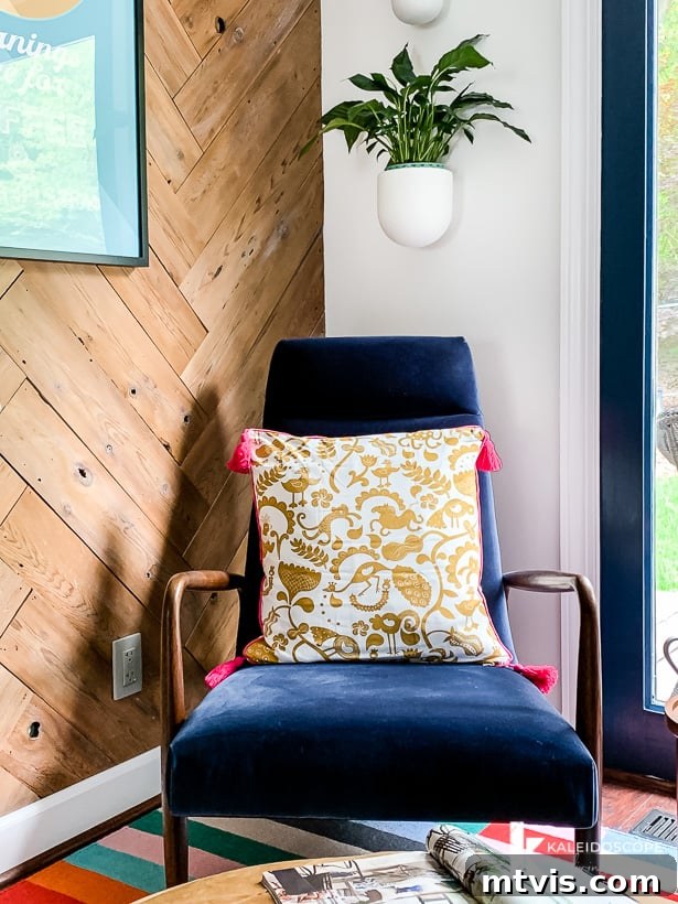 5 Room Transformations Under 100 Dollars, Including Free Options 5 Tassel pillow in a velvet chair, showcasing a budget-friendly accent for room updates and stylish home decorating.