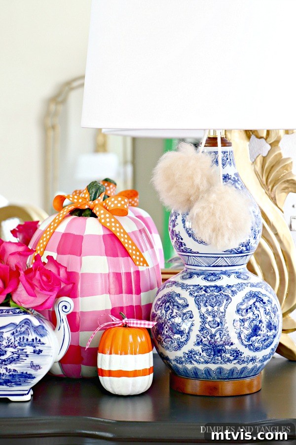 Stylish DIY Fall Decor for Less 5 gingham painted pumpkins in fall vingnette